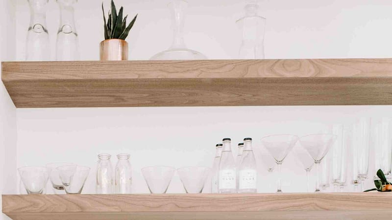 Dishes being displayed on kitchen shelves example 3